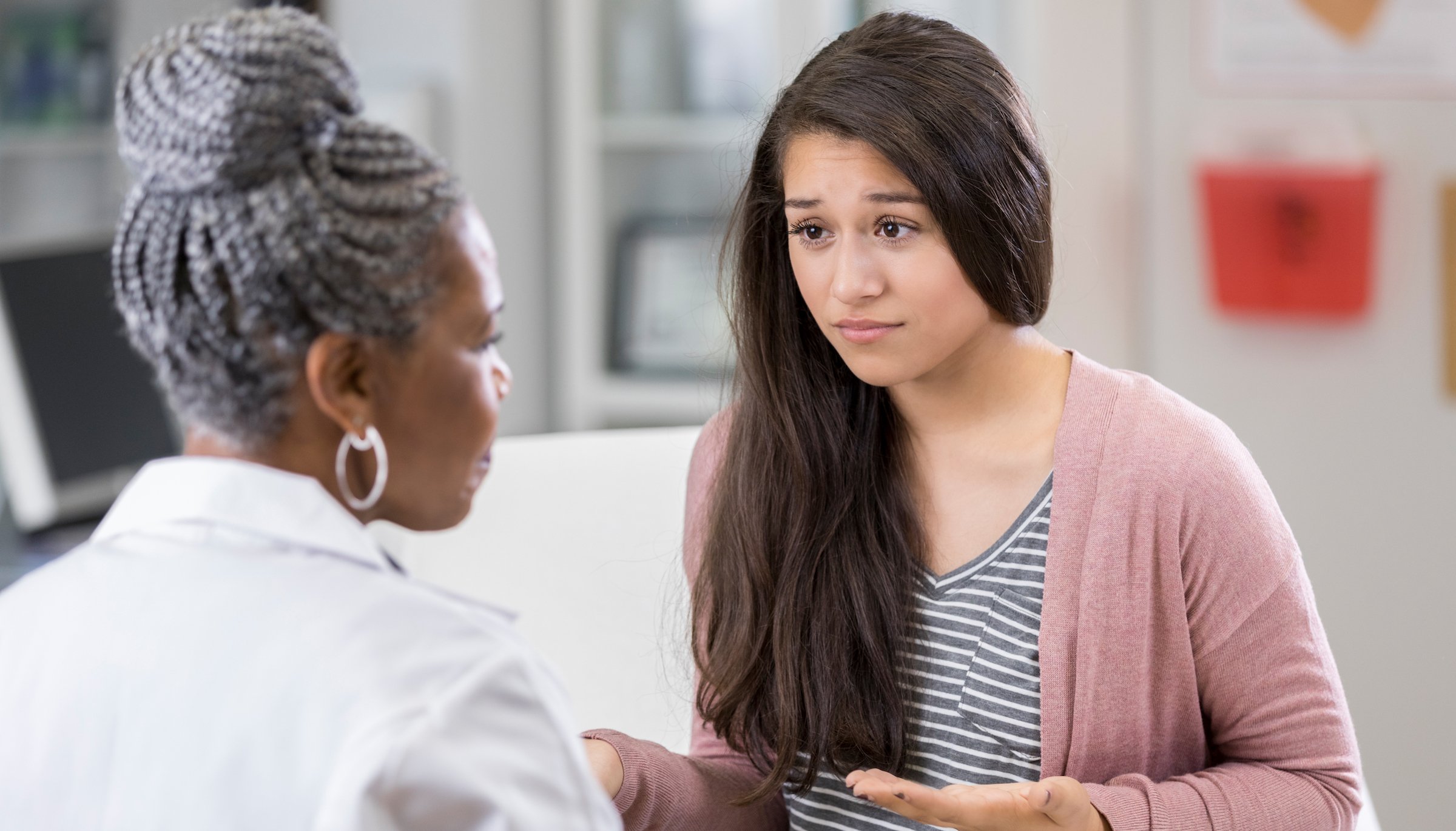 teen girl asking doctor advice