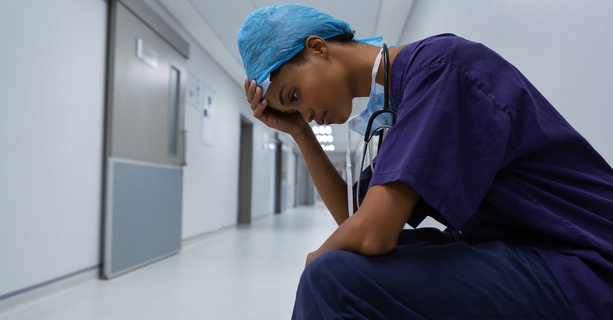 doctor feeling the stress of physician burnout