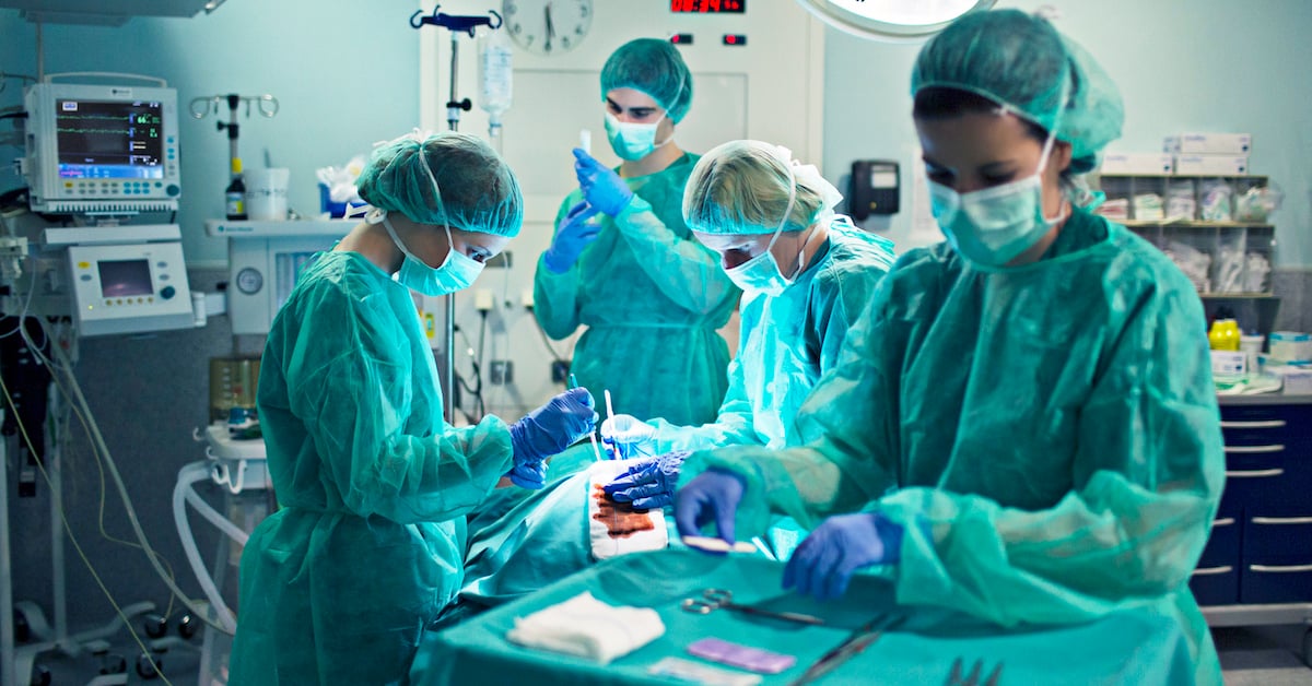 surgical team performing  surgery
